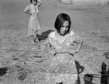 One of Chris Adolph's younger children, FSA Rehab..., near Wapato, Yakima Valley, Washington, 1939. Creator: Dorothea Lange