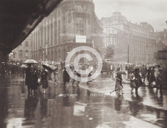 One of Londons wet days. From the album: Photograph album - London, 1920s. Creator: Harry Moult.
