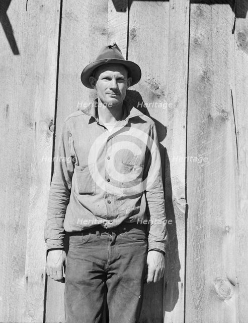 One of the thirty-six members of the Ola self-help sawmill co-op, Gem County, Idaho, 1939. Creator: Dorothea Lange.