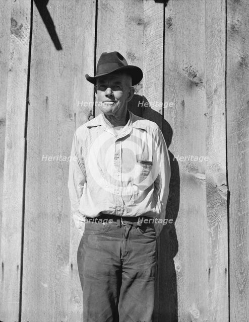 One of the thirty-six members of the Ola self-help sawmill co-op, Gem County, Idaho, 1939. Creator: Dorothea Lange.