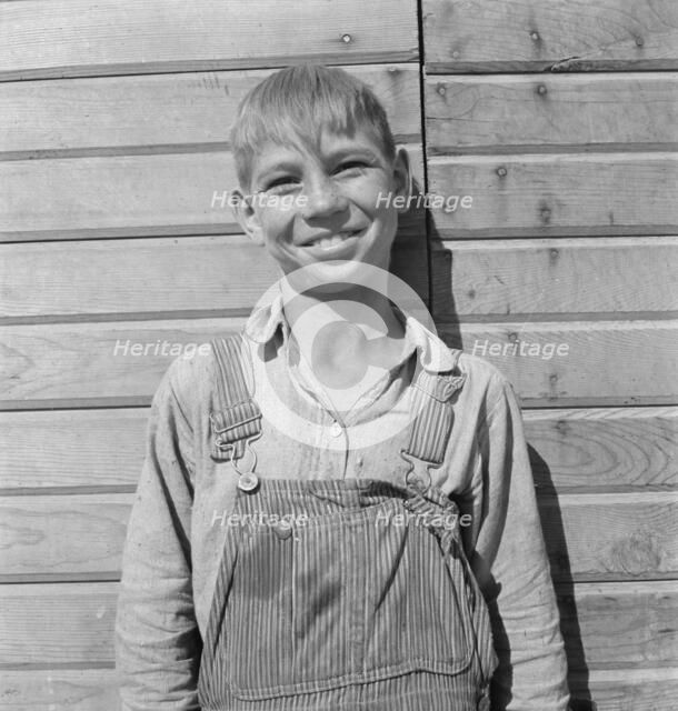One of the younger Cleaver boys on new farm in Malheur County, Oregon, 1939. Creator: Dorothea Lange.