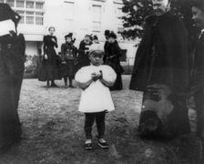One of the youngest egg rollers on the White House lawn, 1898. Creator: Frances Benjamin Johnston