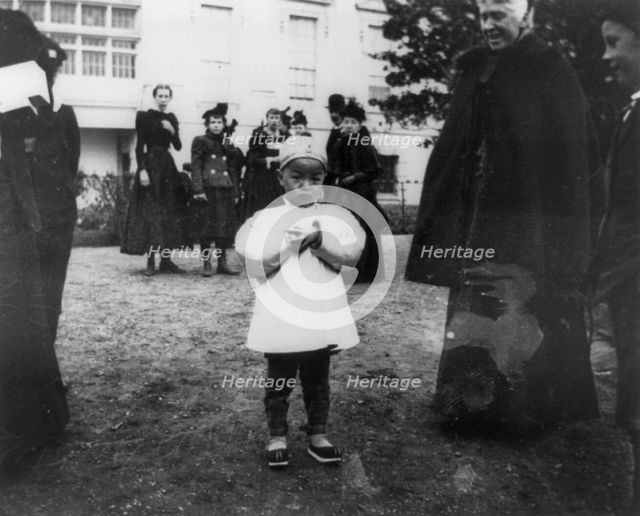 One of the youngest egg rollers on the White House lawn, 1898. Creator: Frances Benjamin Johnston.