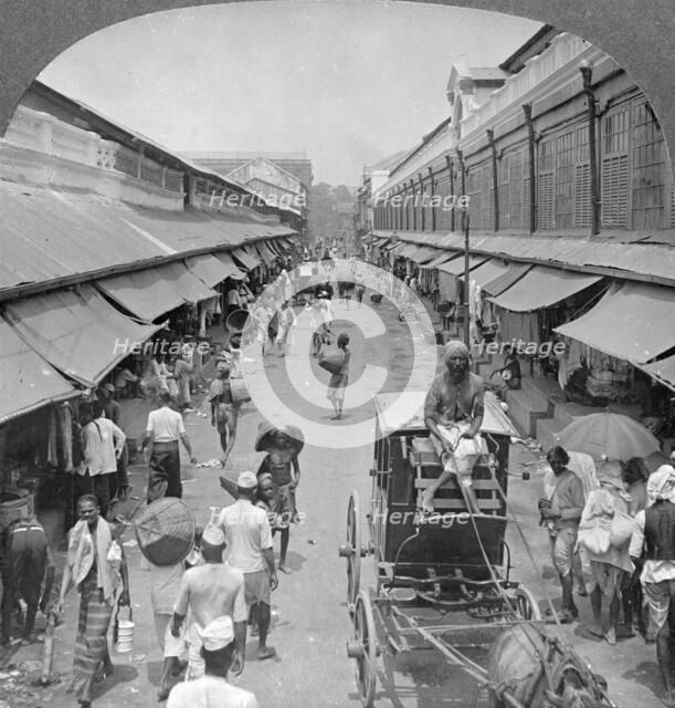 One of the chief native market streets, Rangoon, Burma, 1908. Artist: Stereo Travel Co