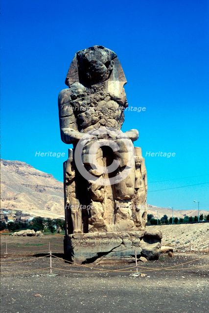 One of the Colossi of Memnon, near the Valley of the Kings, Egypt, 14th century BC. Artist: Unknown