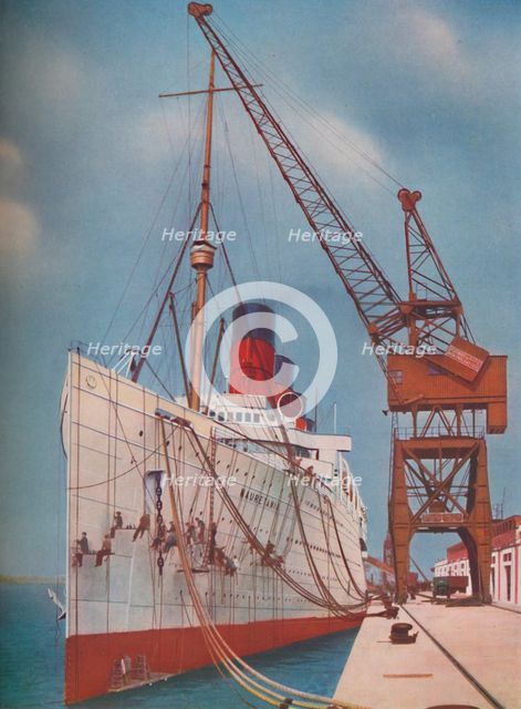 'One of the Most Popular Transatlantic Liners, the Mauretania at Southampton', 1937. Artist: Unknown.