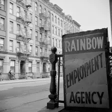One of the numerous employment agency signs in the Harlem area, New York, 1943. Creator: Gordon Parks