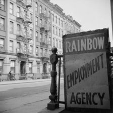 One of the numerous employment agency signs in the Harlem area, New York, 1943. Creator: Gordon Parks