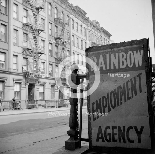 One of the numerous employment agency signs in the Harlem area, New York, 1943. Creator: Gordon Parks.