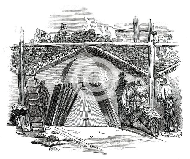 One of the Retorts for Burning the Turf into Charcoal, 1850. Creator: Smyth.