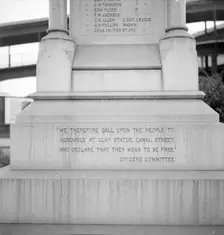 One side of the monument erected to race prejudice, New Orleans, Louisiana, 1936. Creator: Dorothea Lange