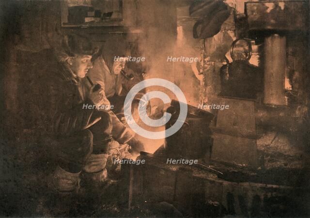 'Oates and Meares at the Blubber-Stove in the Stables', 1911, (1913). Artist: Herbert Ponting.