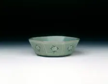Octagonal celadon bowl with inlaid daisy-like flowers, Koryo dynasty, Korea, late 12th century. Creator: Unknown