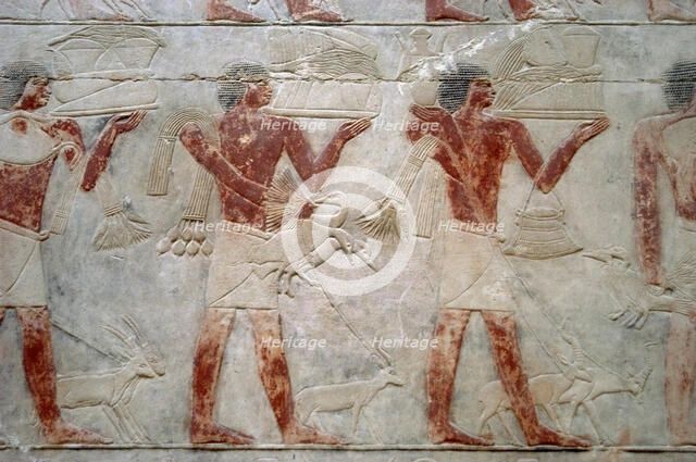 Offering bearers, polychrome relief, Mastaba of Kagemni, Saqqara, Egypt, 2350 BC (2003). Creator: Unknown.