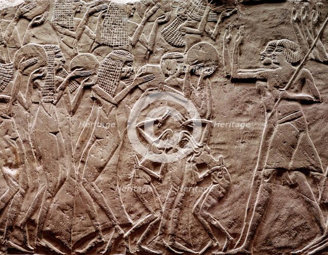 Offering tribute, Ancient Egyptian relief carving. Artist: R Guillemot