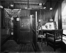 Office, furnishings and artist easel at Mulford & Petry Co., Detroit, Mich., between 1900 and 1910. Creator: Unknown