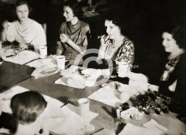 Office girls taking their lunch break, New York, USA, early 1930s. Creator: Unknown.