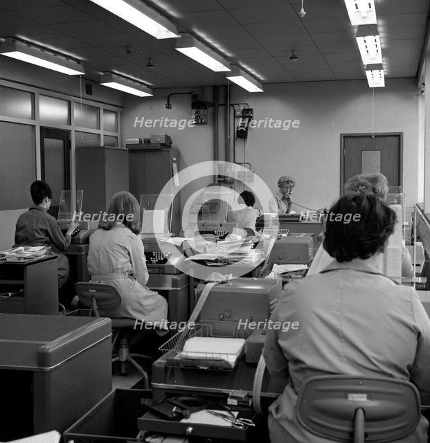 Office scene, Park Gate Iron & Steel Co, Rotherham, South Yorkshire, 1964. Creator: Michael Walters.