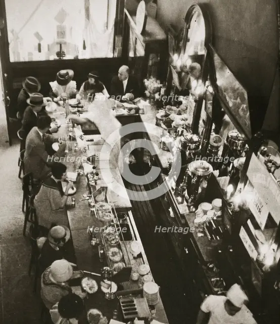 Office workers having lunch at the drug store counter, New York, USA, c1920s-c1930s.  Creator: Unknown.