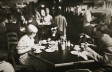 Office workers lunching in a restaurant, New York, USA, early 1930s. Creator: Unknown