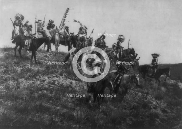 Oglala war party, c1907. Creator: Edward Sheriff Curtis.