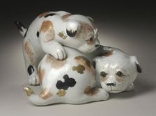 Okimono in the Form of a Pair of Gamboling Piebald Puppies, 19th century. Creator: Unknown