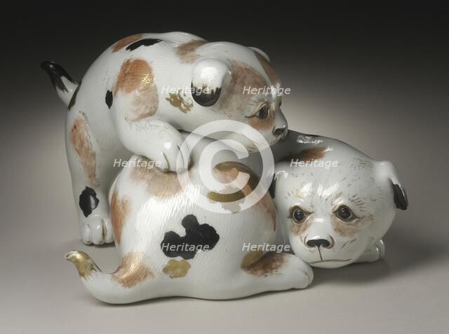 Okimono in the Form of a Pair of Gamboling Piebald Puppies, 19th century. Creator: Unknown.