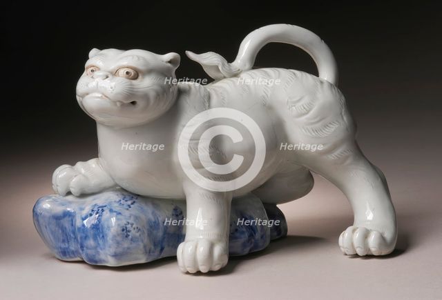 Okimono in the Form of a Tiger Climbing onto a Rock, 19th century. Creator: Unknown.