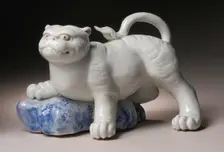 Okimono in the Form of a Tiger Climbing onto a Rock, 19th century. Creator: Unknown