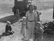 Oklahoma mother of five children, now picking cotton in California, near Fresno, 1936. Creator: Dorothea Lange