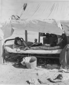 Oklahoma potato picker's family encamped on the flats near Shafter, California, 1935. Creator: Dorothea Lange