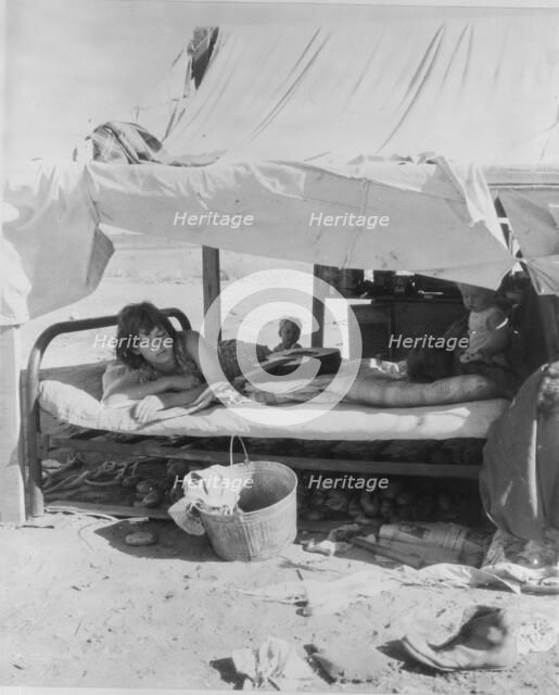 Oklahoma potato picker's family encamped on the flats near Shafter, California, 1935. Creator: Dorothea Lange.