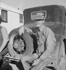 Oklahoman from Chickasaw in potato pickers camp, Kern County, California, 1937. Creator: Dorothea Lange