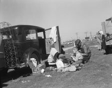 Oklahomans bound for Oregon along a highway in California, 1937. Creator: Dorothea Lange