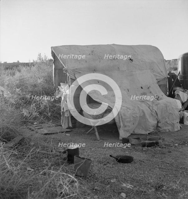 Oklahomans encamped on a river bottom near Holtville, California, 1937. Creator: Dorothea Lange.