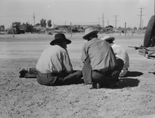 Oklahomans now working or looking for work in the pea harvests of California, Imperial Vallery, 1937 Creator: Dorothea Lange