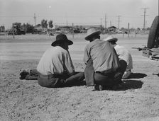 Oklahomans now working or looking for work in the pea harvests of California, Imperial Vallery, 1937 Creator: Dorothea Lange