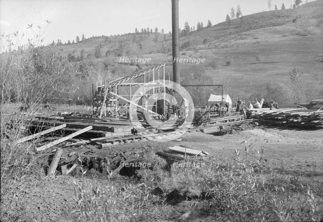 Ola self-help sawmill under construction, Idaho, 1939. Creator: Dorothea Lange.