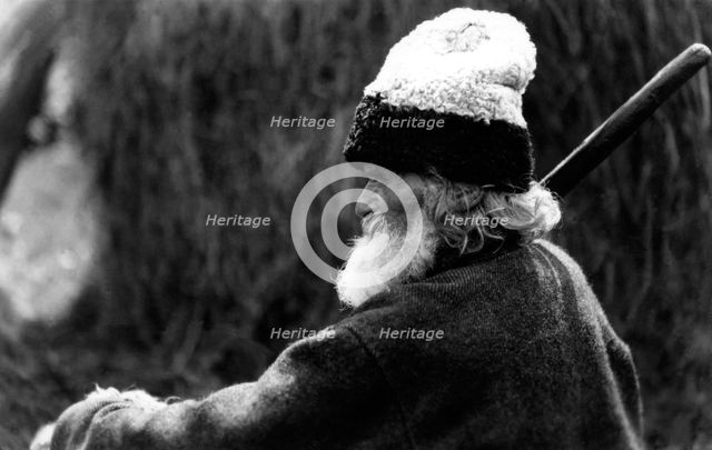 Old man wearing a woolly hat, Bistrita Valley, Moldavia, north-east Romania, c1920-c1945. Artist: Adolph Chevalier