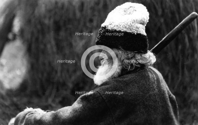 Old man wearing a woolly hat, Bistrita Valley, Moldavia, north-east Romania, c1920-c1945. Artist: Adolph Chevalier