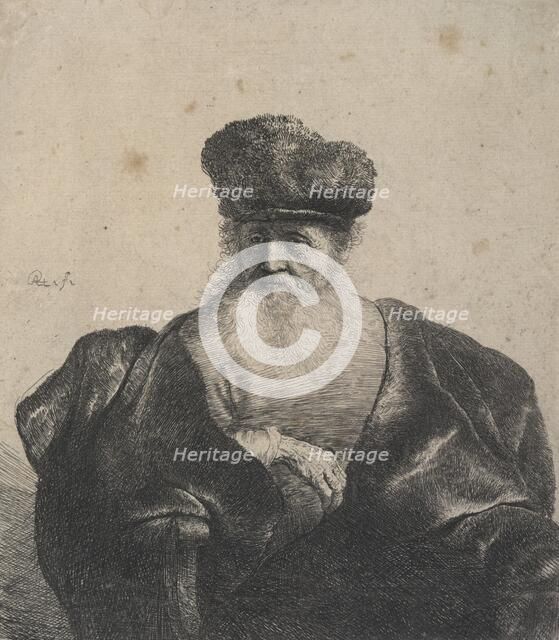 Old man with beard, fur cap, and velvet cloak, c.1631. Creator: Rembrandt Harmensz van Rijn.
