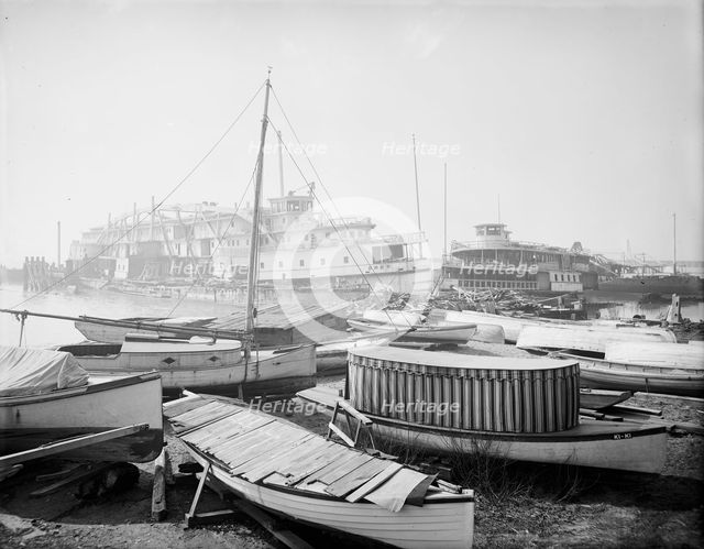 Old boats beached to rot away, New York City, between 1900 and 1910. Creator: Unknown.