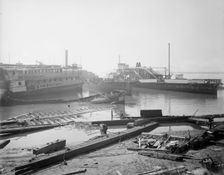 Old boats beached to rot away, New York City, between 1900 and 1910. Creator: Unknown