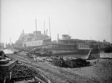 Old boats beached to rot away, New York City, between 1900 and 1910. Creator: Unknown