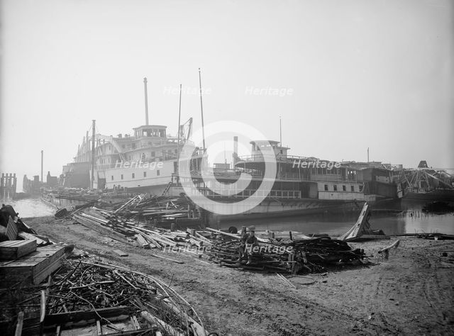 Old boats beached to rot away, New York City, between 1900 and 1910. Creator: Unknown.
