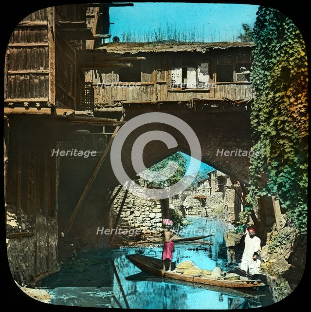 Old bridge, Srinagar, Kashmir, India, late 19th or early 20th century. Artist: Unknown