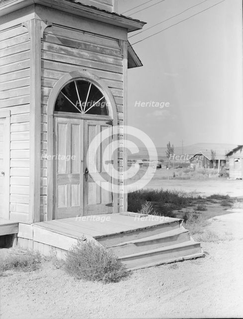 Old Catholic church on edge of potato town, Merrill, Klamath County, Oregon, 1939. Creator: Dorothea Lange.