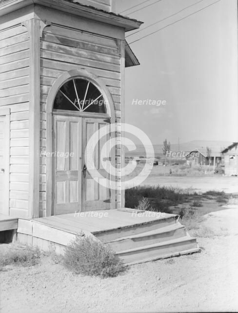Old Catholic church on edge of potato town, Merrill, Klamath County, Oregon, 1939. Creator: Dorothea Lange.