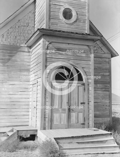 Old Catholic church on edge of potato town, Merrill, Klamath County, Oregon, 1939. Creator: Dorothea Lange.