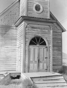 Old Catholic church on edge of potato town, Merrill, Klamath County, Oregon, 1939. Creator: Dorothea Lange